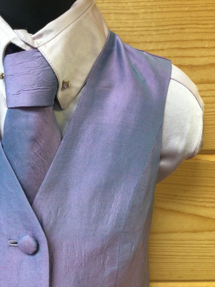 C 26 W 24 NW 16.5 Vest